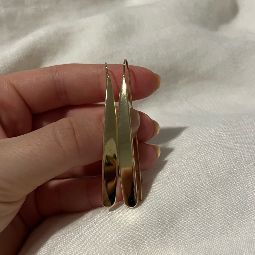 Gold earrings made in Austin Texas. Worn once.